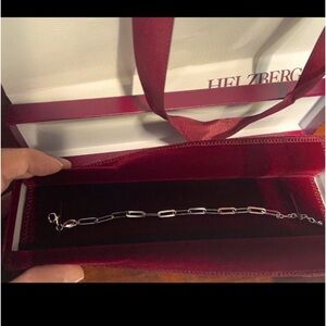 Brand new. Silver Helzberg paper clip bracelet 8 inches